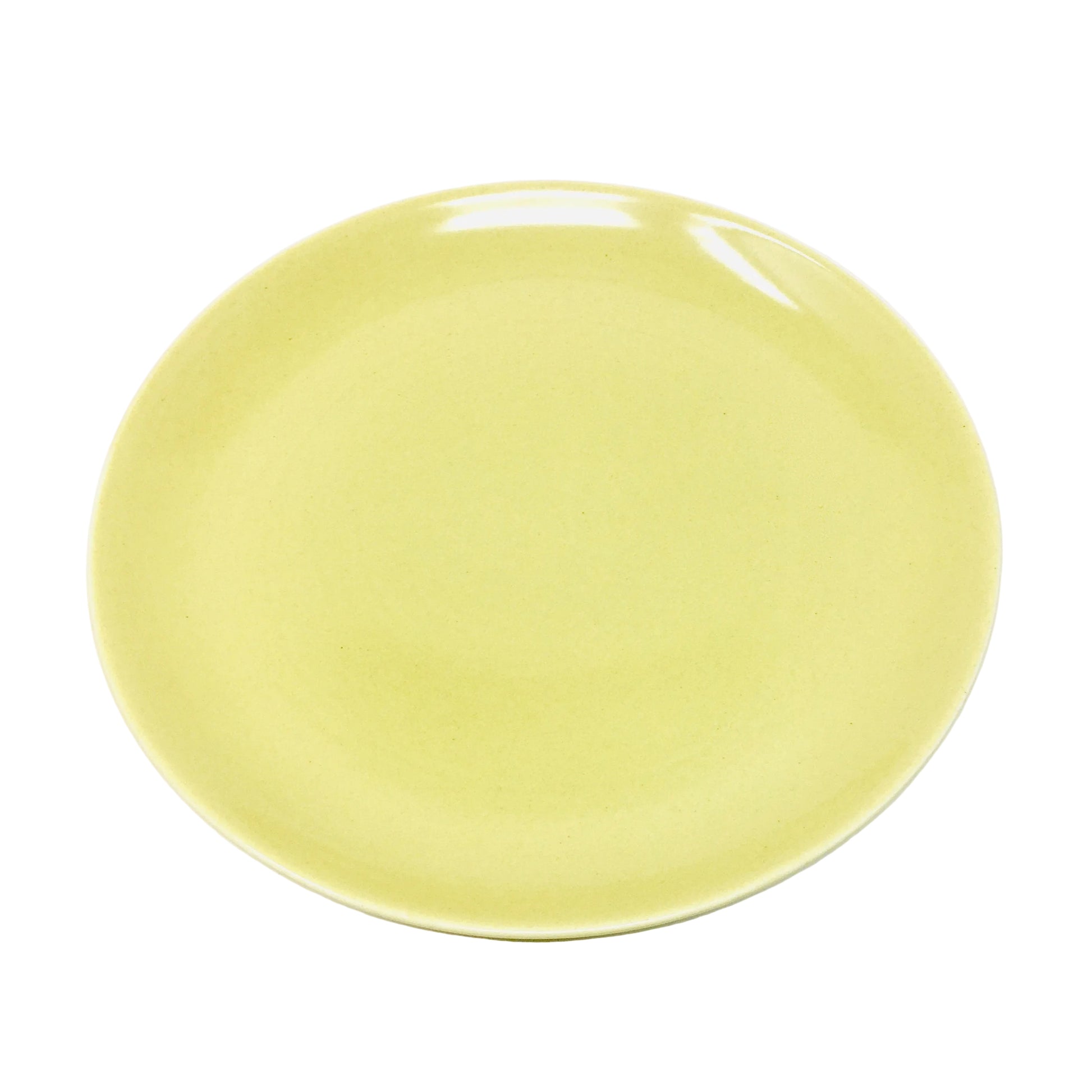 Yellow ceramic plate on a white background