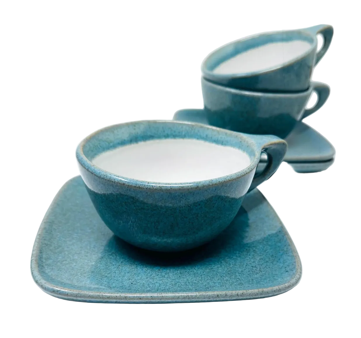 Set of blue ceramic dishes including cups and saucers on a white background